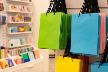 Colorful shopping bags in the trading floor. Close-up