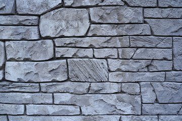 Stone wall background. A place for text, advertising or a logo