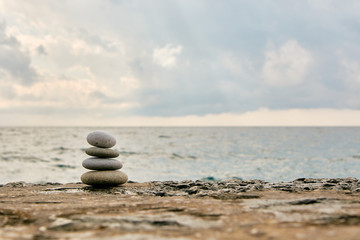 Balance, peace of mind, different sizes stones form a pyramid.
