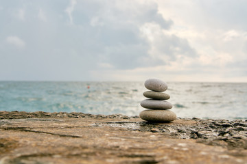 Balance, peace of mind, different sizes stones form a pyramid.