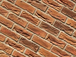 Old red brick wall texture background, orange stone block wall texture, rough and grunge surface as used for backdrop, wallpaper and graphic web design. Interior home new pattern designed structure 