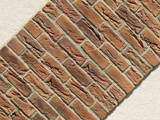 Old red brick wall texture background, orange stone block wall texture, rough and grunge surface as used for backdrop, wallpaper and graphic web design. Interior home new pattern designed structure 