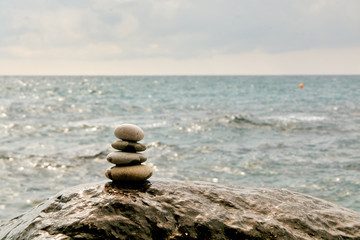 Balance, peace of mind, different sizes stones form a pyramid.