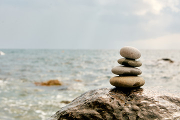 Balance, peace of mind, different sizes stones form a pyramid.
