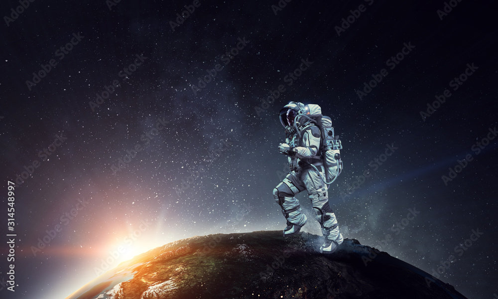 Wall mural exploring outer space. mixed media