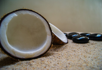 coconut, massage, sand, oil, coconut oil, obsidian, rocks, hot stones, alternative therapies,...
