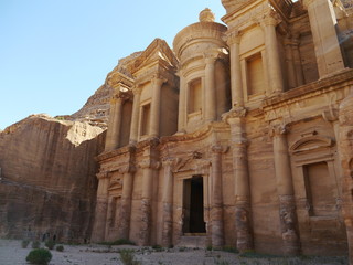 Fototapeta premium side view of famous Al Deir Monastery in the ancient city of Petra, Jordan, Middle East. One of new Seven Wonders of the World.
