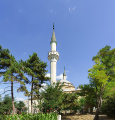 Fototapeta na wymiar Minarets of the Juma Khan-Jami mosque in Yevpatoria