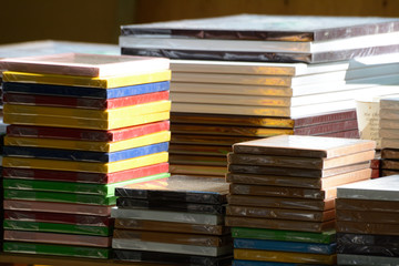 Pile of picture frames at the market for sale on the sunlight