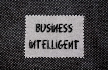 Business Intelligent words written on a chalkboard