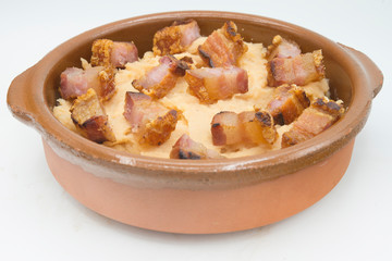 mashed potatoes with slice of bacon