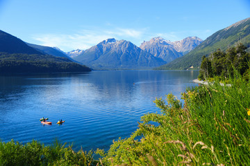 Tourists enjoying the blue waters of Mascardi lake in a canoe, south of San Carlos de Bariloche in...