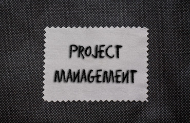 Project management words written on a chalkboard