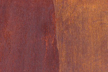 Rusty metal surface. Iron corroded texture background. The left is dark, the right is light.