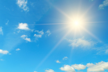 Obraz na płótnie Canvas Blue sky. Bright midday sun illuminates the space.