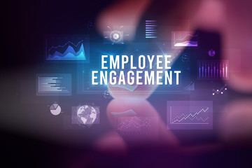 Finger touching tablet with charts and EMPLOYEE ENGAGEMENT inscription, business concept