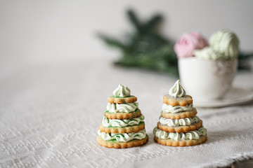 green, pink, marshmallows in a cup, herringbone-shaped cake