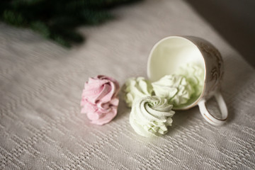 green, pink, marshmallows in a cup, herringbone-shaped cake