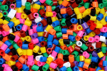 Fototapeta na wymiar Colorful beads on the water, multicolor background