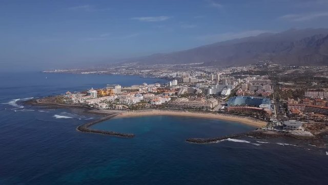 Aerial panorama of Los Cristianos resorts and Playa del Camison beach, Tenerife, Canary islands, Spain.