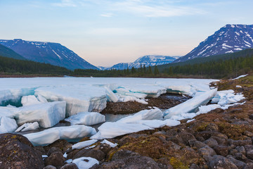 Snow and ice on the banks of the river Hoisey. Putorana Plateau, Taimyr