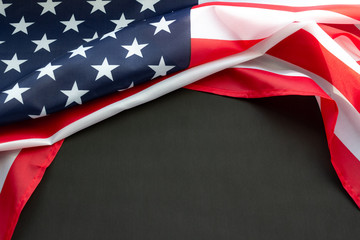 Flag of USA on black background with copy space. Concept of the patriotic holidays: presidents,...
