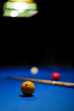 Three-cushion billiards Game consist in to carom the cue ball off both object balls and contact the rail cushions at least three times before the last object ball. Carom billiards concept