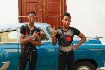 young cubans dancing in the street II , trinidad