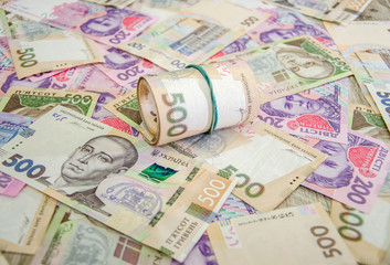 Ukrainian hryvnia background. Much money.
