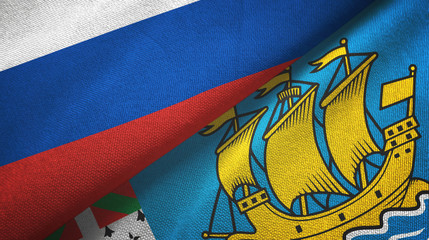 Russia and Saint Pierre and Miquelon two flags textile cloth, fabric texture