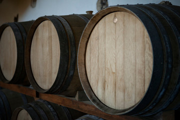 wine barrels in a warehouse