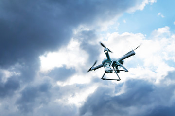 Close up Drone flying a cloudy sky