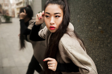 Asian model red lips black hair