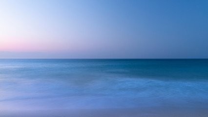 Fototapeta na wymiar Epic zen like colorful vbrant peaceful long exposure seascape of ocean
