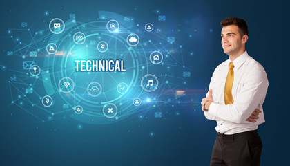 Businessman thinking in front of technology related icons and TECHNICAL inscription, modern technology concept