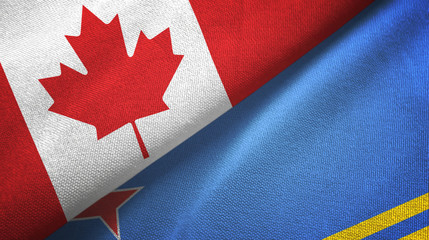 Fototapeta na wymiar Canada and Aruba two flags textile cloth, fabric texture