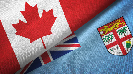 Canada and Fiji two flags textile cloth, fabric texture