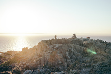 sea bay with rocks at sunrise