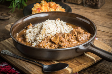 Barley groats with stewed meat.
