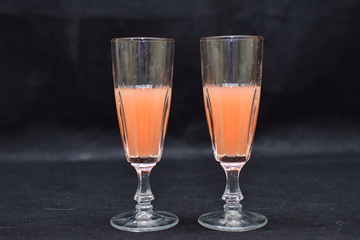 Mock up  design set of elegant and traditional drink ware / drinking glass & Jar for wine or juice, transparent isolated on black background template for branding identity and company logo