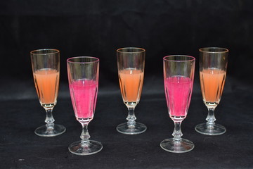 Mock up  design set of elegant and traditional drink ware / drinking glass & Jar for wine or juice, transparent isolated on black background template for branding identity and company logo isolated