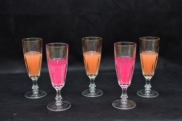 Mock up  design set of elegant and traditional drink ware / drinking glass & Jar for wine or juice, transparent isolated on black background template for branding identity and company logo isolated