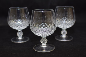 Mock up  design set of elegant and traditional drink ware / drinking glass & Jar for wine or juice, transparent isolated on black background template for branding identity and company logo isolated