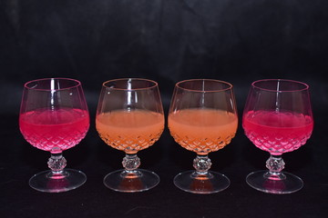 Mock up  design set of elegant and traditional drink ware / drinking glass & Jar for wine or juice, transparent isolated on black background template for branding identity and company logo isolated