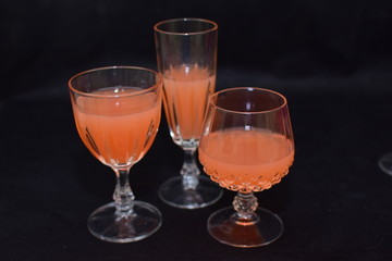 Mock up  design set of elegant and traditional drink ware / drinking glass & Jar for wine or juice, transparent isolated on black background template for branding identity and company logo isolated