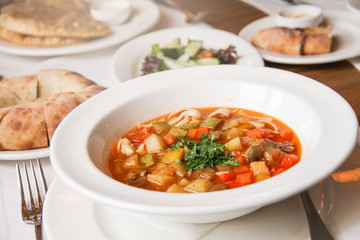 Tasty soup with lamb and vegetables. Eastern culture.