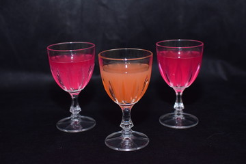 Mock up  design set of elegant and traditional drink ware / drinking glass & Jar for wine or juice, transparent isolated on black background template for branding identity and company logo isolated