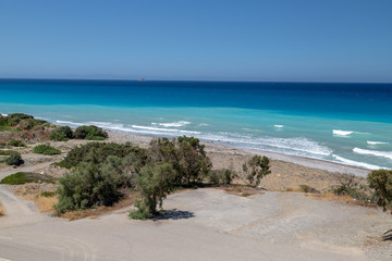 Gravel / pebble beach at the southwest coast of Rhodes island near Apolakkia with multi colored...