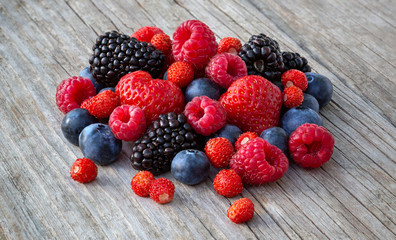 Ripe berries on a wooden board
