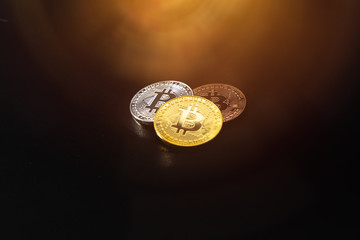 Bitcoin on a dark background. Economic crisis. 